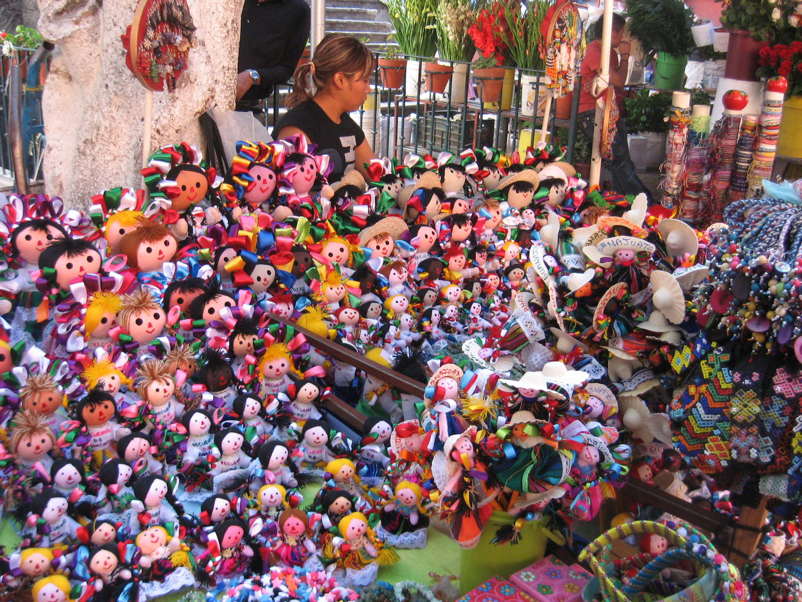 Children selling dolls at a stand in Monterrey