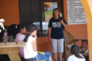 Betty Betscher sharing a lesson with the older children during VBS