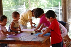 Children working on an art project during craft time 